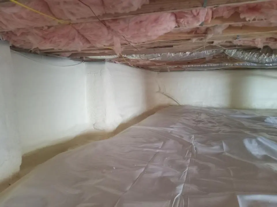 Crawl space encapsulation with closed-cell spray foam for Storm Damage Roof Repair in Lapeer